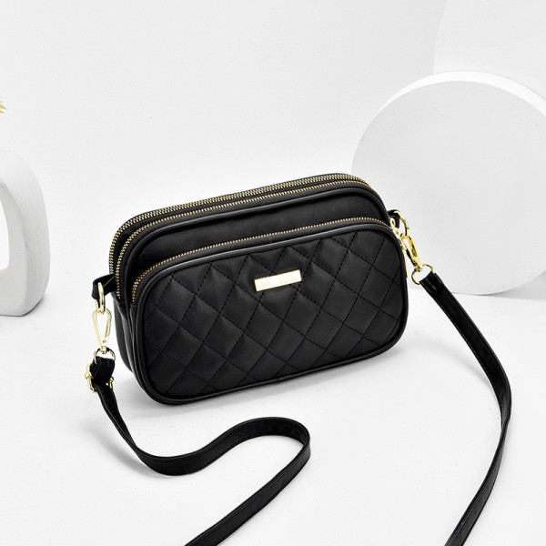 Eko bőrből készült alkalmi női táska cipzárral és hosszú füllel