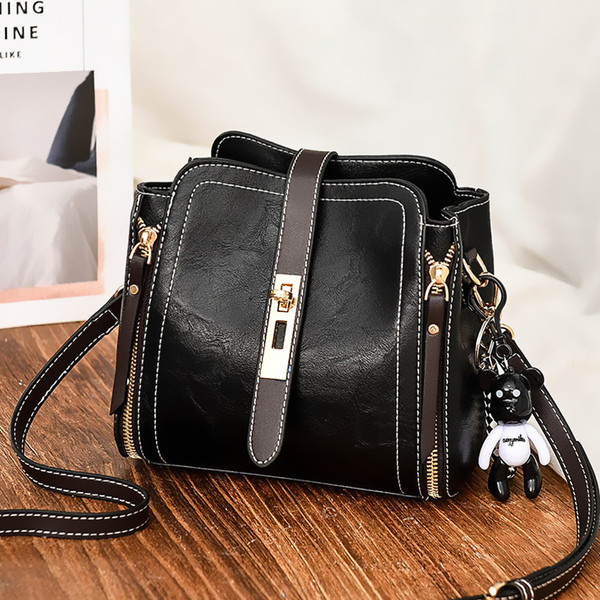 Väike naiste kunstnahast õlakott