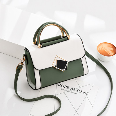 Moodne väike naistekott kunstnahast, metallelemendiga