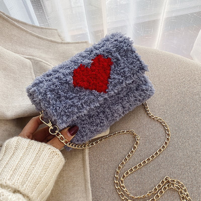 Mindennapi női pehelytáska fémlánccal