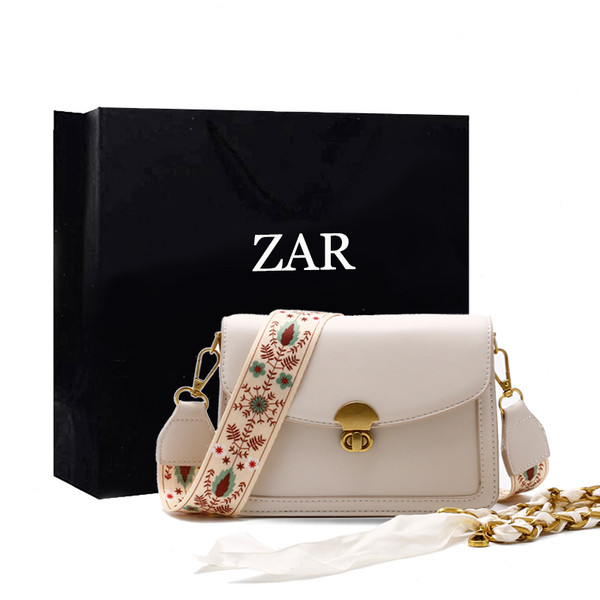 Väike metalllukuga kunstnahast õlakott