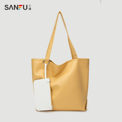 Naiste nahast kott pikkade sangadega kolmes värvitoonis