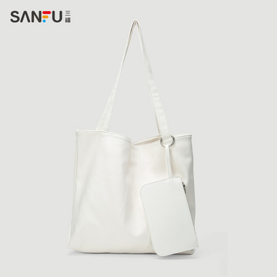 Naiste nahast kott pikkade sangadega kolmes värvitoonis