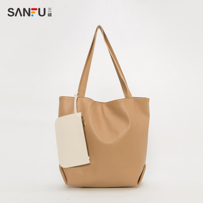 Naiste nahast kott pikkade sangadega kolmes värvitoonis