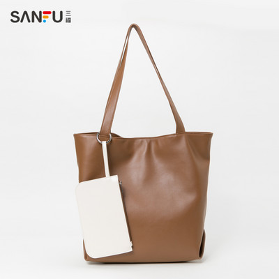 Naiste nahast kott pikkade sangadega kolmes värvitoonis