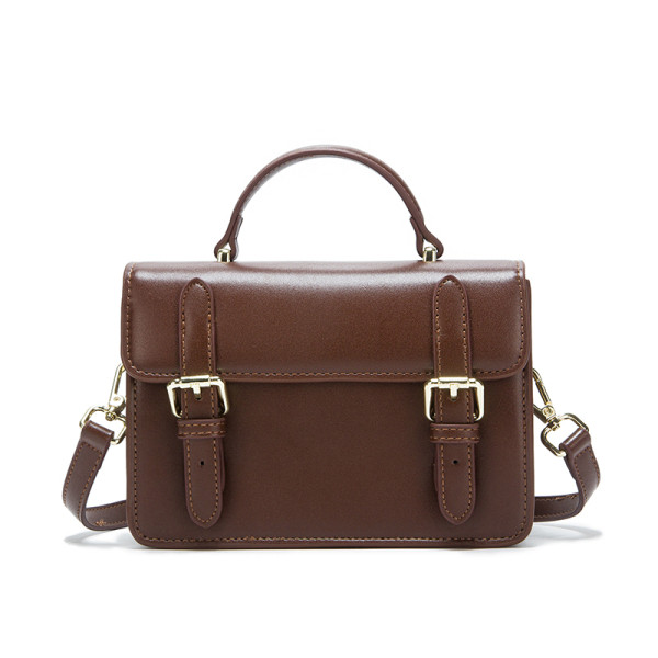 Väike retrostiilis pandlaga nahkkott