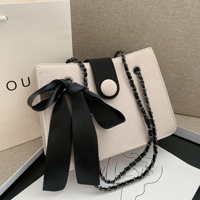 Σύγχρονη γυναικεία τσάντα με κορδέλα