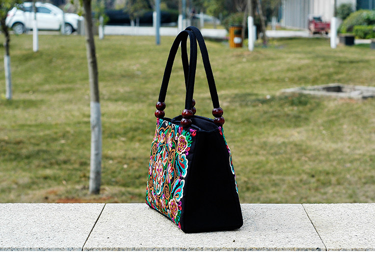 Naiste vabaajakott värvilise tikandiga