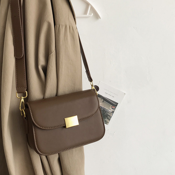 Naiste metallist lukuga nahast kott