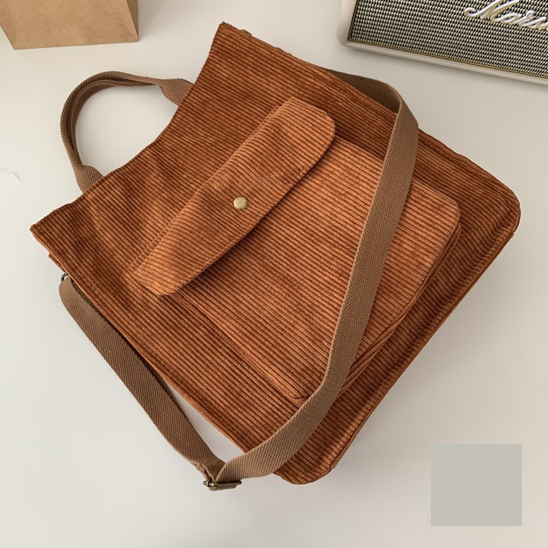 Suur tekstiilist kott kahe sanga ja taskuga