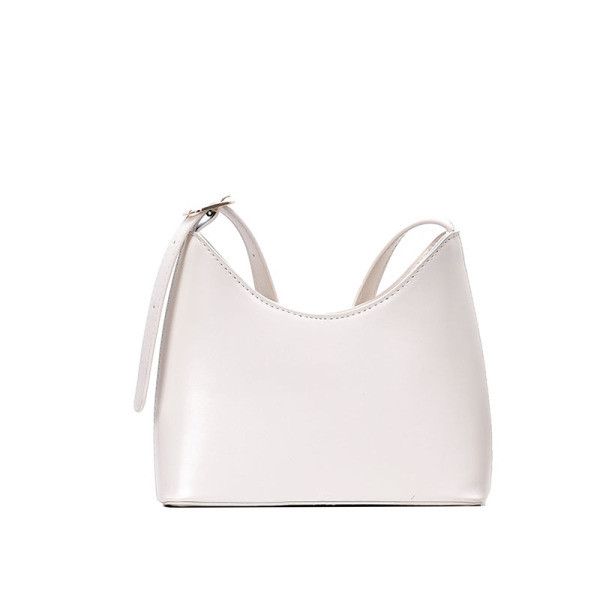 Väike pika sangaga nahast kott