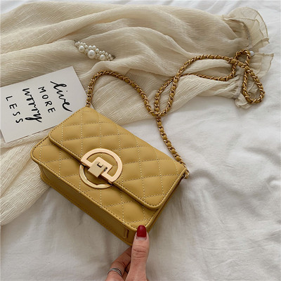 Moodne naistekott keti ja metallist lukuga