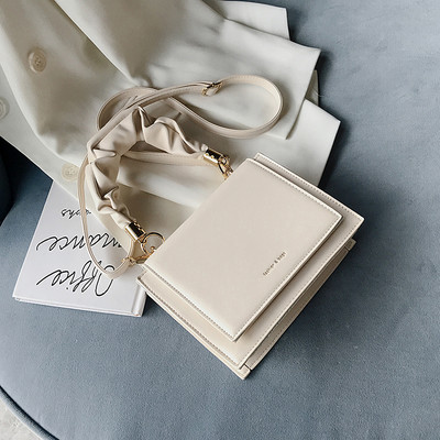 Praegune lühikese ja pika sangaga naistekott