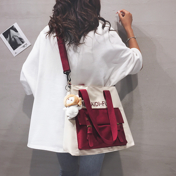 Uue mudeli kahe sangaga naiste tekstiilist kott