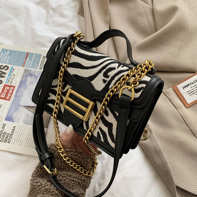 Naiste nahast kott metallist luku ja pika ketiga