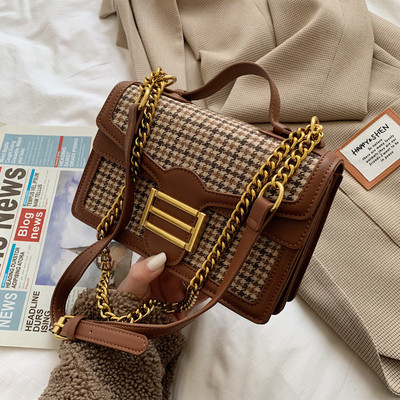 Naiste nahast kott metallist luku ja pika ketiga