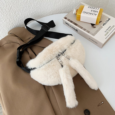 Női pehelytáska cipzárral és hosszú füllel