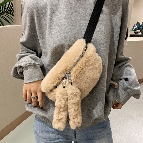 Női pehelytáska cipzárral és hosszú füllel