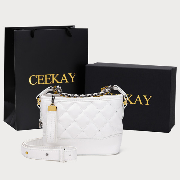 Ženska kožna torba s dugom ručkom i patentnim zatvaračem