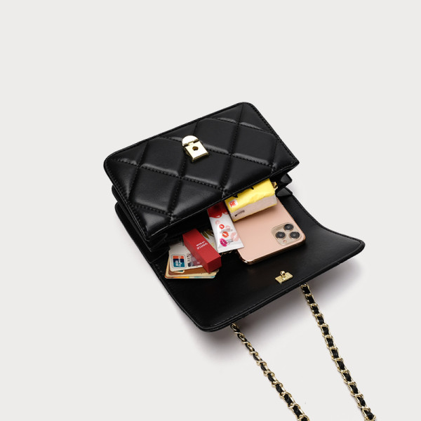 Moodne metallist käepidemega nahast kott