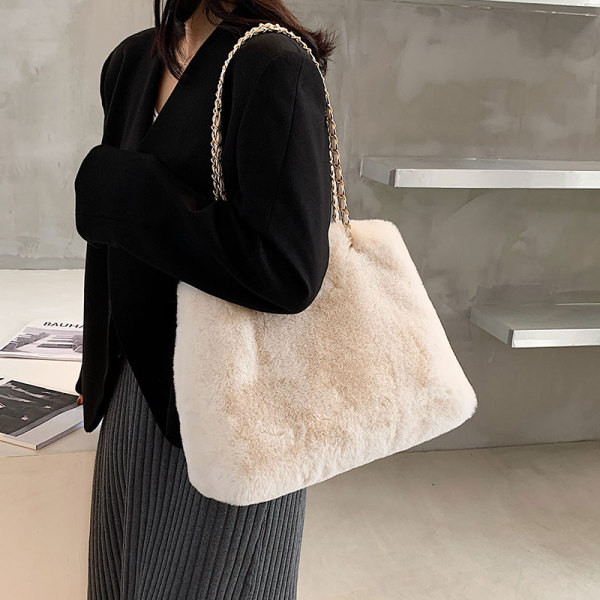 Ženska puhasta torba u tri boje