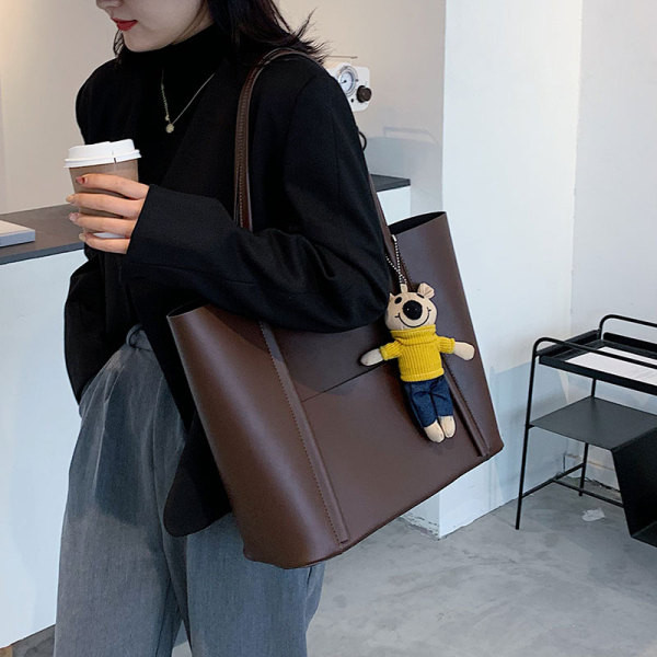 3D elemendi ja nahast käepidemetega nahast käekott