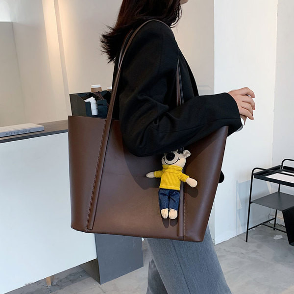 3D elemendi ja nahast käepidemetega nahast käekott