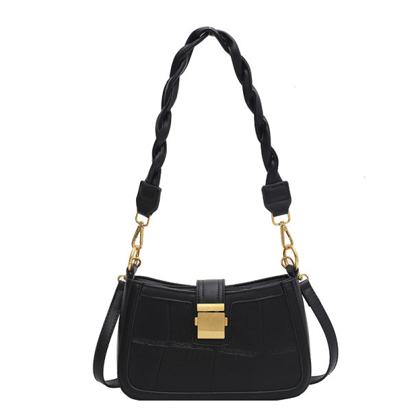 Ženska kožna torba s metalnom kopčom i pletenom ručkom