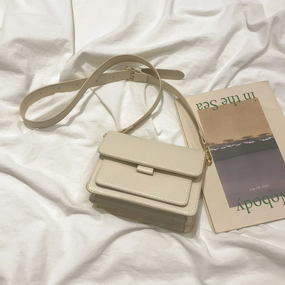 Modern női táska eko bőrből, hosszú füllel