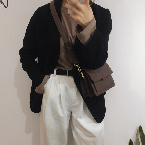 Modern női táska eko bőrből, hosszú füllel