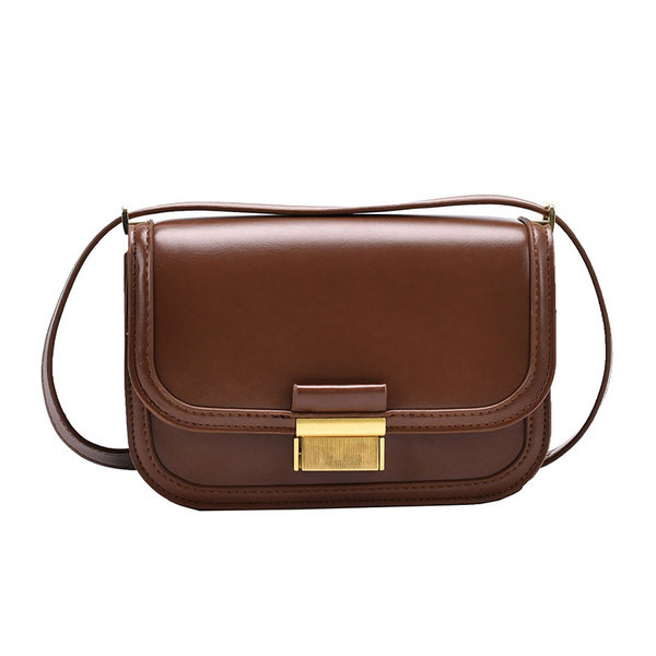 Väike metallpandlaga nahast kott