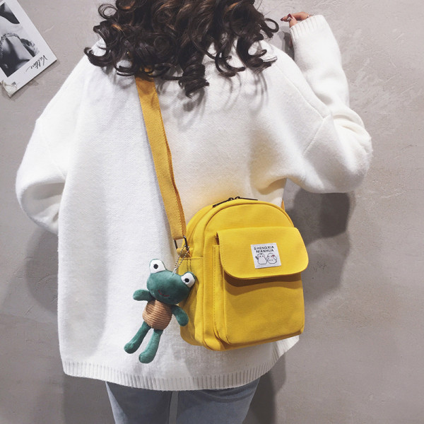 Modern női kistáska textil zsebbel