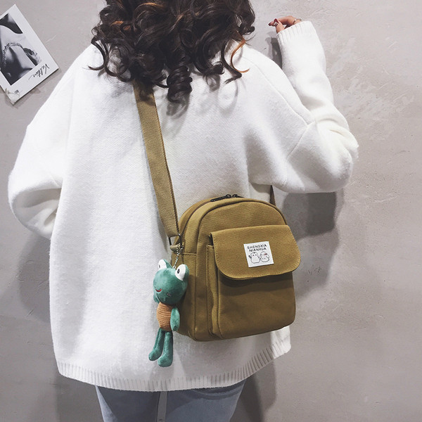 Modern női kistáska textil zsebbel