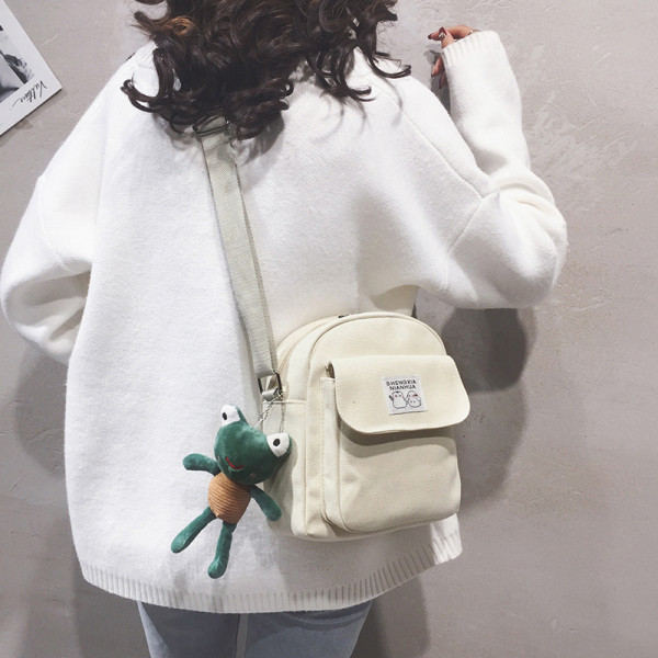 Modern női kistáska textil zsebbel