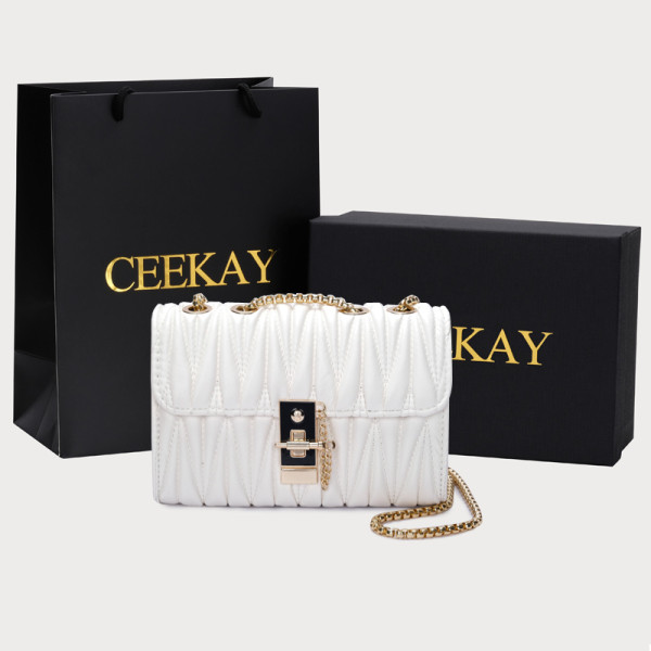 Női bőr táska csattal és hosszú fogantyúval