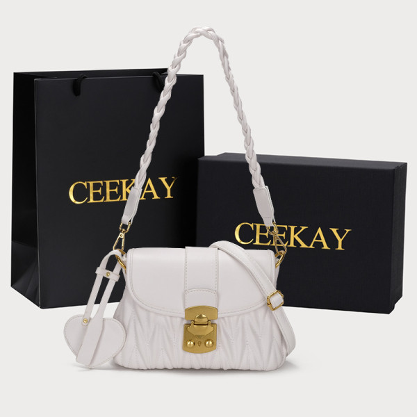 Ženska kožna torba s kopčom i dugom ručkom