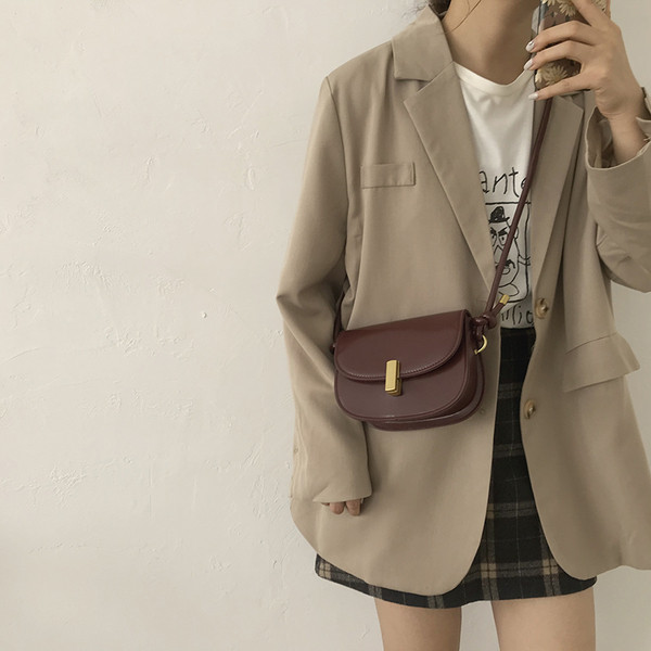 Moodne väike ökonahast kott metallist lukuga