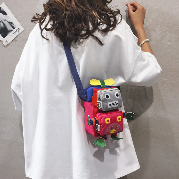 Šarena mala ženska torba s ručkom za rame