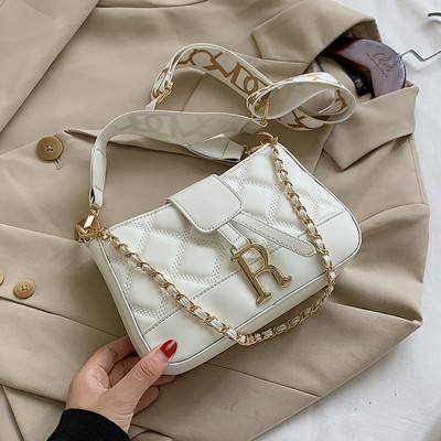 Stiilne naiste nahast kott metallist elemendiga kolmes värvitoonis