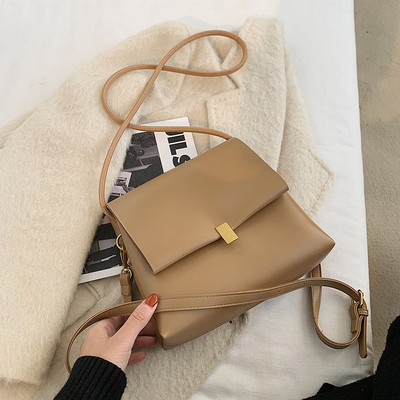 Kaasaegne pika õhukese sangaga ökonahast naistekott