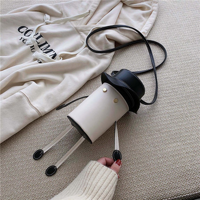 Eko bőrből készült modern női táska hosszú füllel, 3D elemekkel