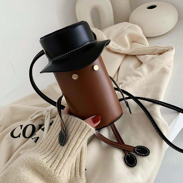 Eko bőrből készült modern női táska hosszú füllel, 3D elemekkel