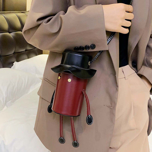 Eko bőrből készült modern női táska hosszú füllel, 3D elemekkel