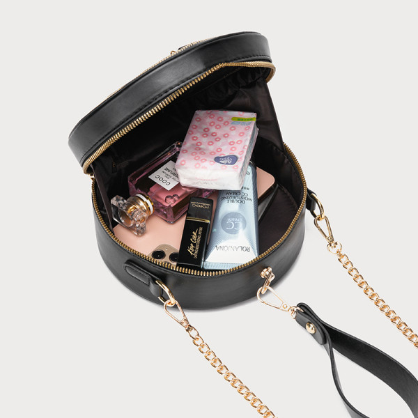 Naiste ümarkott lühikese ja pika sangaga