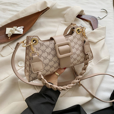 Pruunis ja beežis naiste vabaajakott