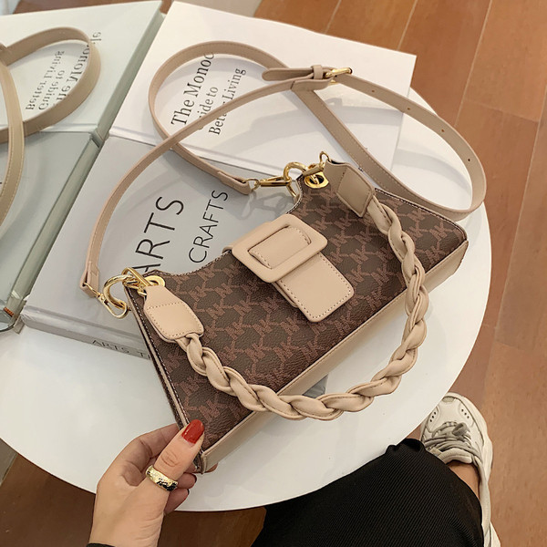 Pruunis ja beežis naiste vabaajakott