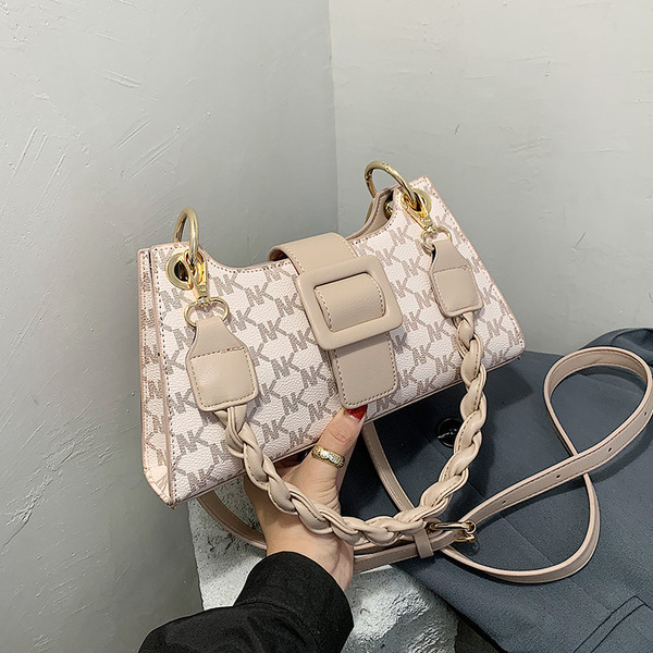 Pruunis ja beežis naiste vabaajakott