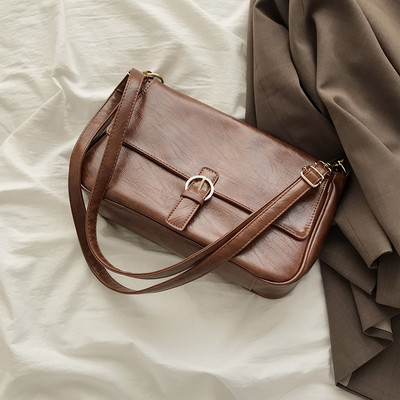 Naiste õhukeste sangadega nahast kott