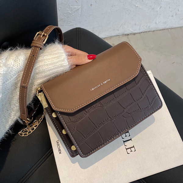 Uue mudeli ajakohane metallelementidega naistekott