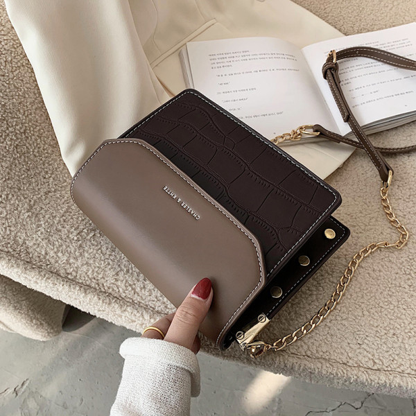 Uue mudeli ajakohane metallelementidega naistekott